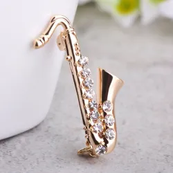 Gouden kristallen saxofoon - brocheBroches