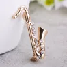 Golden crystal saxophone - broochBrooches