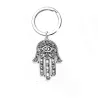 Chakra Hamsa hand / natuurlijke zeshoekige steen - sleutelhangerSleutelhangers