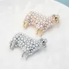 Sheep brooch with pearlsBrooches