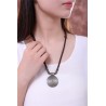Vintage necklace - round metal pendant - leather ropeNecklaces