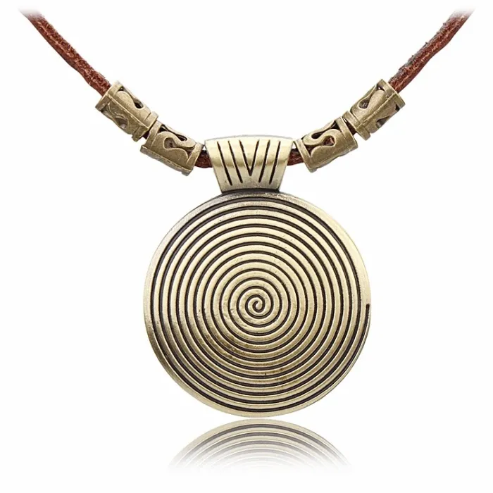 Vintage ketting - ronde metalen hanger - leren touwHalskettingen
