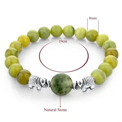 Groene natuursteen kralen / zilveren olifant - armbandArmbanden