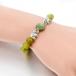 Groene natuursteen kralen / zilveren olifant - armbandArmbanden