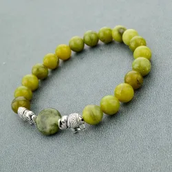 Groene natuursteen kralen / zilveren olifant - armbandArmbanden