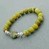 Groene natuursteen kralen / zilveren olifant - armbandArmbanden