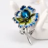 Emaille blauwe bloem met kristallen - zilveren brocheBroches