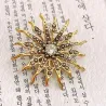 Retro broche - zon met kristallenBroches