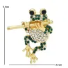 Fluit spelende kristallen kikker - brocheBroches