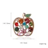 Appelvormige broche met kristallenBroches
