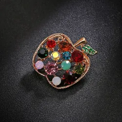 Appelvormige broche met kristallenBroches
