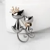 Dubbele katten brocheBroches