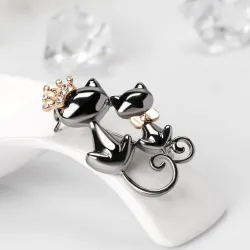 Dubbele katten brocheBroches