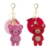 Kristallen teddybeer met pom pom van bont - sleutelhangerSleutelhangers
