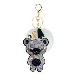 Kristallen teddybeer met pom pom van bont - sleutelhangerSleutelhangers