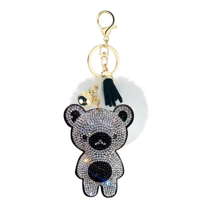 Kristallen teddybeer met pom pom van bont - sleutelhangerSleutelhangers