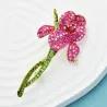 Kristallen orchideebloem - elegante brocheBroches