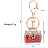 Golden crystal bag - keychainKeyrings