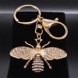 Gouden sleutelhanger met een kristallen bijSleutelhangers