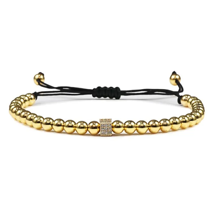 Armband van koperen kralen met een kristallen kubus - verstelbaar touwArmbanden
