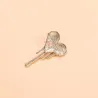 Hartvormige broche met zirkoonBroches