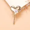 Hartvormige broche met zirkoonBroches
