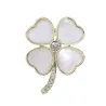 Broche klavertje vier - schelp / kristalBroches