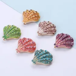 Kristallen schelp - elegante brocheBroches