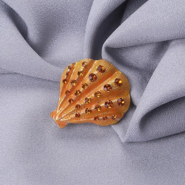 Kristallen schelp - elegante brocheBroches