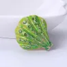 Kristallen schelp - elegante brocheBroches