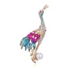 Kristallen kraanvogel met parel - brocheBroches