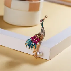 Kristallen kraanvogel met parel - brocheBroches