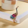 Kristallen kraanvogel met parel - brocheBroches