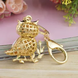 Zittend op de tak witte kristallen uil - sleutelhangerSleutelhangers