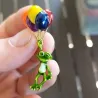Groene kikker met kleurrijke ballonnen - brocheBroches