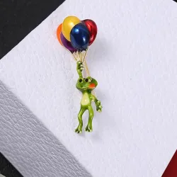Groene kikker met kleurrijke ballonnen - brocheBroches
