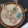 Kristallen schildpad sleutelhanger - roze - wit - turquoise - groenSleutelhangers