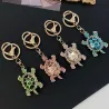Kristallen schildpad sleutelhanger - roze - wit - turquoise - groenSleutelhangers