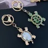 Kristallen schildpad sleutelhanger - roze - wit - turquoise - groenSleutelhangers