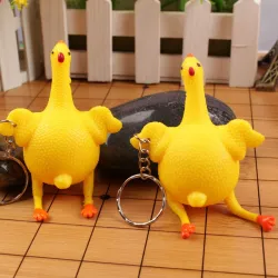 New Funny Spoof Tricky Gadgets Green Dinosaur Beans Toy Chicken Egg Laying Hens Crowded Stress BallSleutelhangers