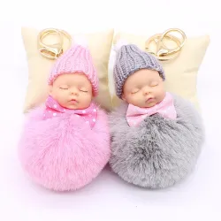 Slapende babypop - sleutelhangerSleutelhangers