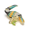 Elegant brooch with crystal toucan birdBroches