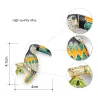 Elegant brooch with crystal toucan birdBroches