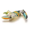 Elegant brooch with crystal toucan birdBroches