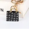 Crystal black handbag - keychainSleutelhangers