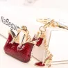 Two crystal red bags & high-heeled shoe - keychainSleutelhangers