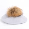 Elegant beret with fur pom-pomHats & Caps