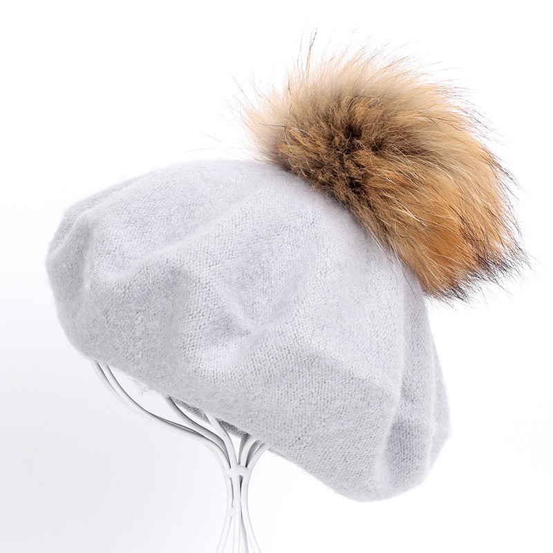 Elegant beret with fur pom-pomHats & Caps