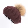 Elegant beret with fur pom-pomHats & Caps